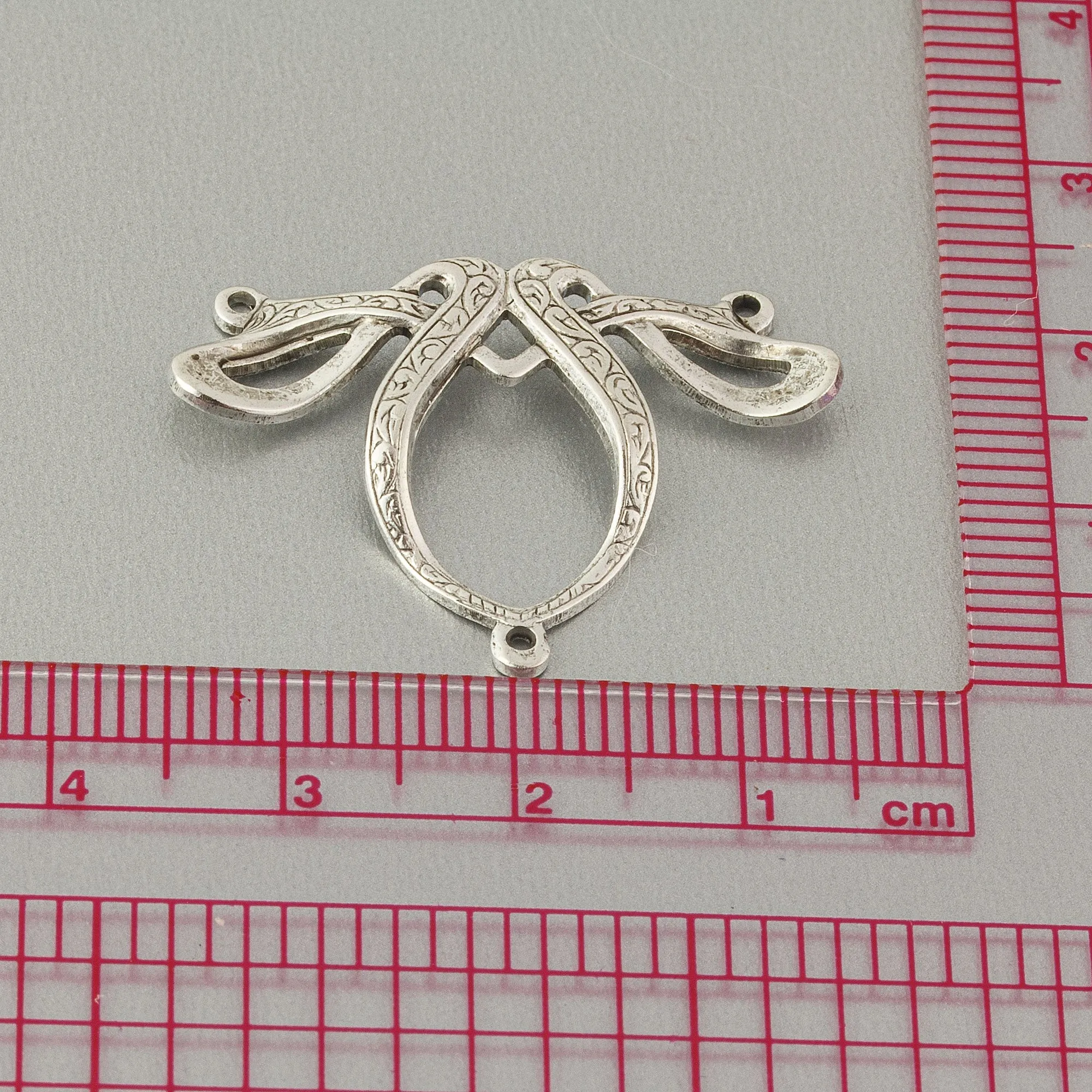 Art Nouveau design, high quality stamped silver plated brass connector. 22 x 30mm. Sold individually. b9-0844s