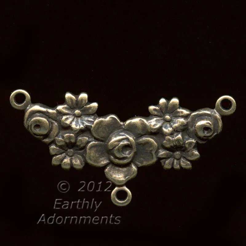 Oxidized stamped brass 3 ring connector in floral garland motif. 26mm x 10mm. Pkg. of 2. b9-0834